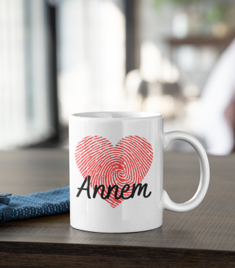 mockup-of-an-11-oz-coffee-mug-placed-on-a-dark-wooden-table-31320